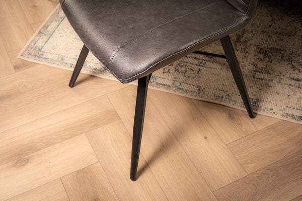 Orion Faux Leather Dining Chair in Grey with Black Powder Coated Metal Legs
