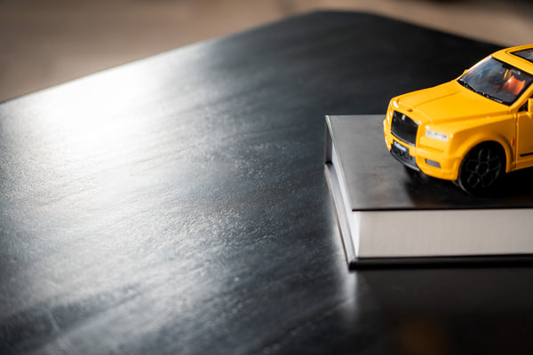 Amazon Solid Mango Wood Black Coffee Table with Metal Butterfly Inserts 110 cm