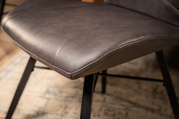 Orion Faux Leather Dining Chair in Grey with Black Powder Coated Metal Legs