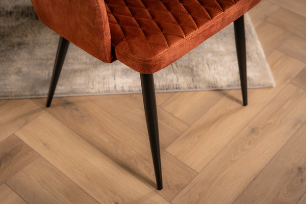 Glamour Elegant Brown Rust Velvet Chair with Decorative Quilting and Black Legs